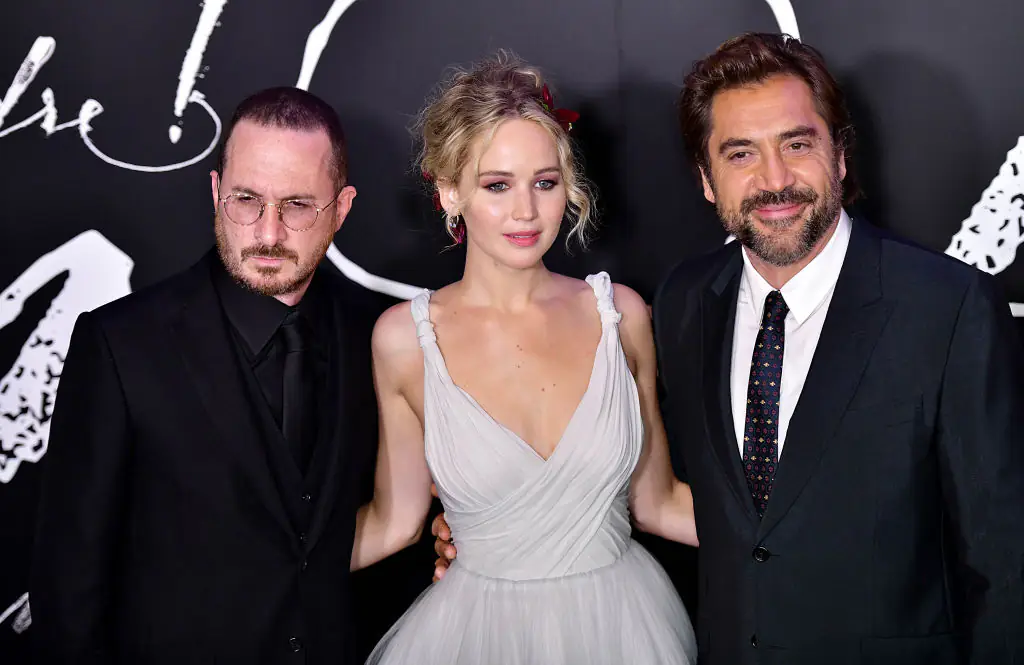 Director Darren Aronofsky with stars Jennifer Lawrence and Javier Bardem. Credit: James Devaney / Getty