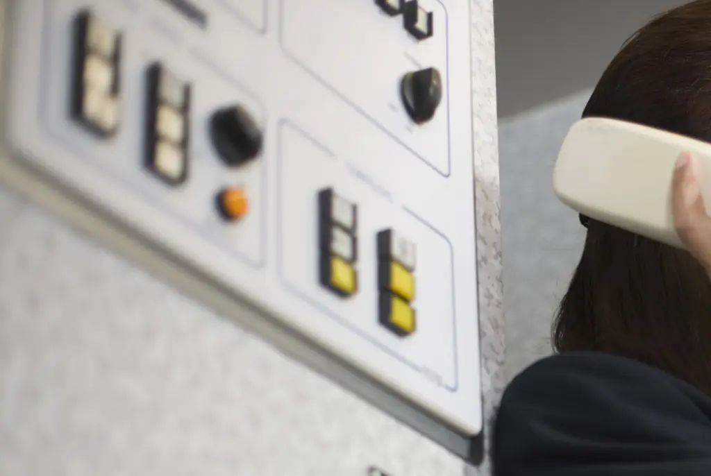 Flight attendant explains the real reason they say 'hello' to you as you board a flight