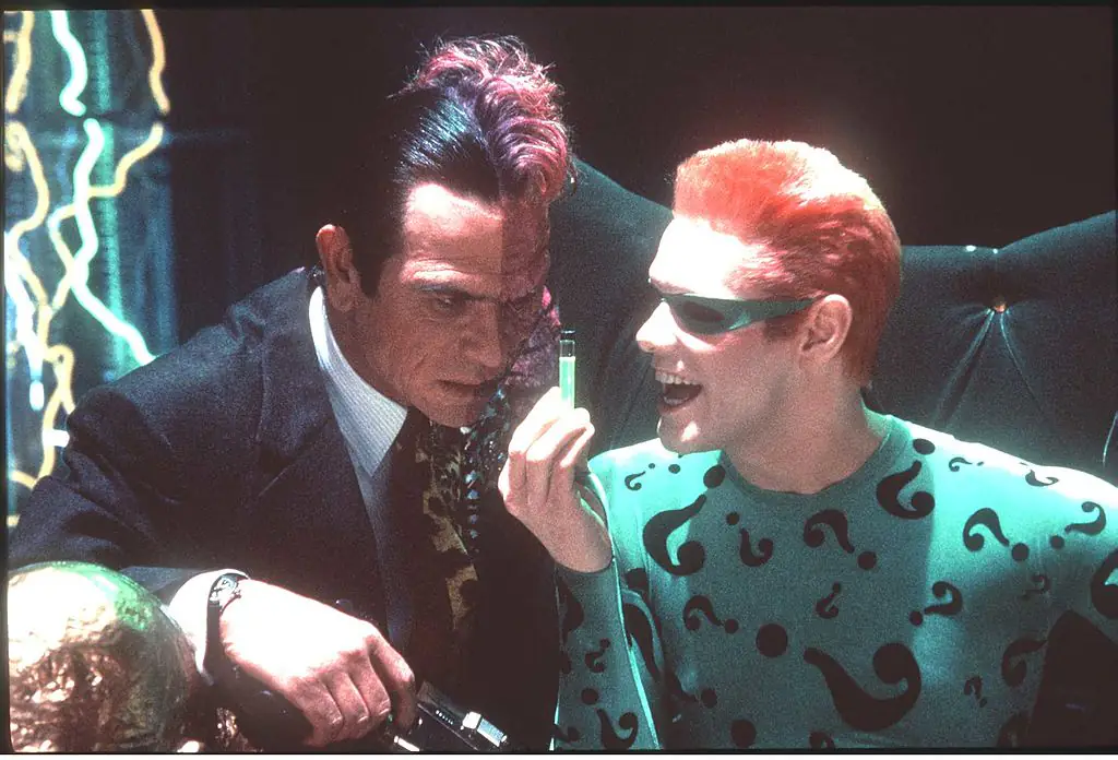 Jones (left) and Carrey (right) starred as Two-Face and The Riddler. Credit: Hulton Archive/Getty Images