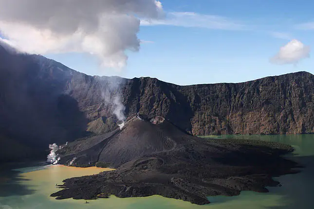 Desperate race to save dancer, 26, trapped in active volcano for three days