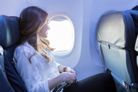 Controversial 'flying naked' trend leaves travelers feeling 'free'