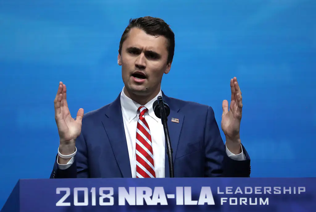 New footage shows Charlie Kirk person of interest walking in bizarre manner towards Utah campus before shooting