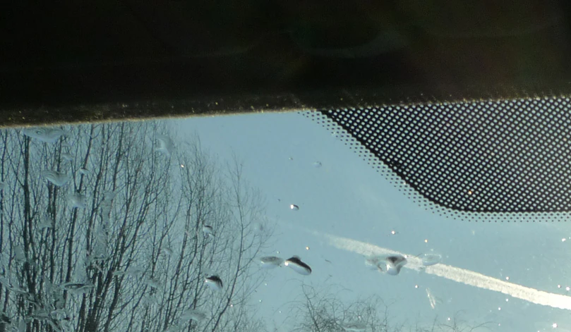 Some people are only just discovering what those tiny dots on your windshield are actually for