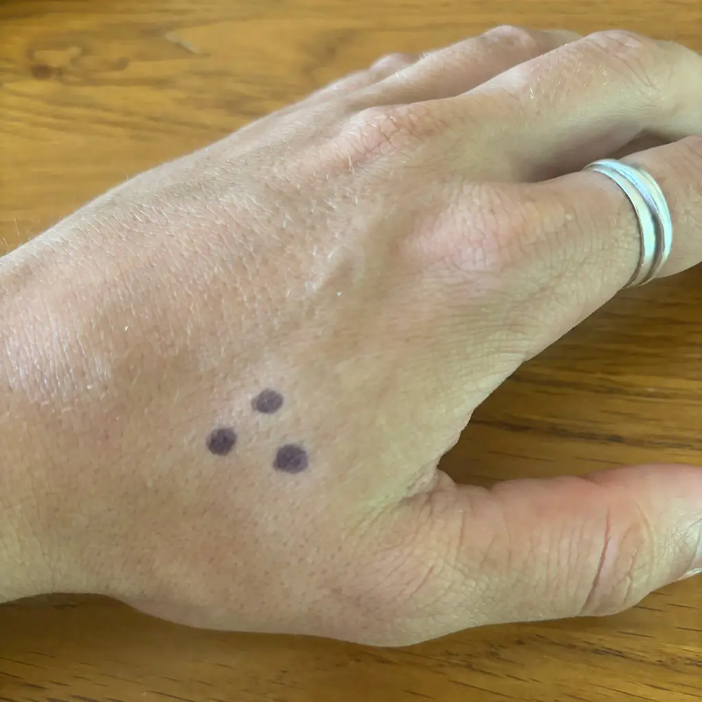 The three-dot tattoo has a particularly dark meaning. Credit: Jungle Creations