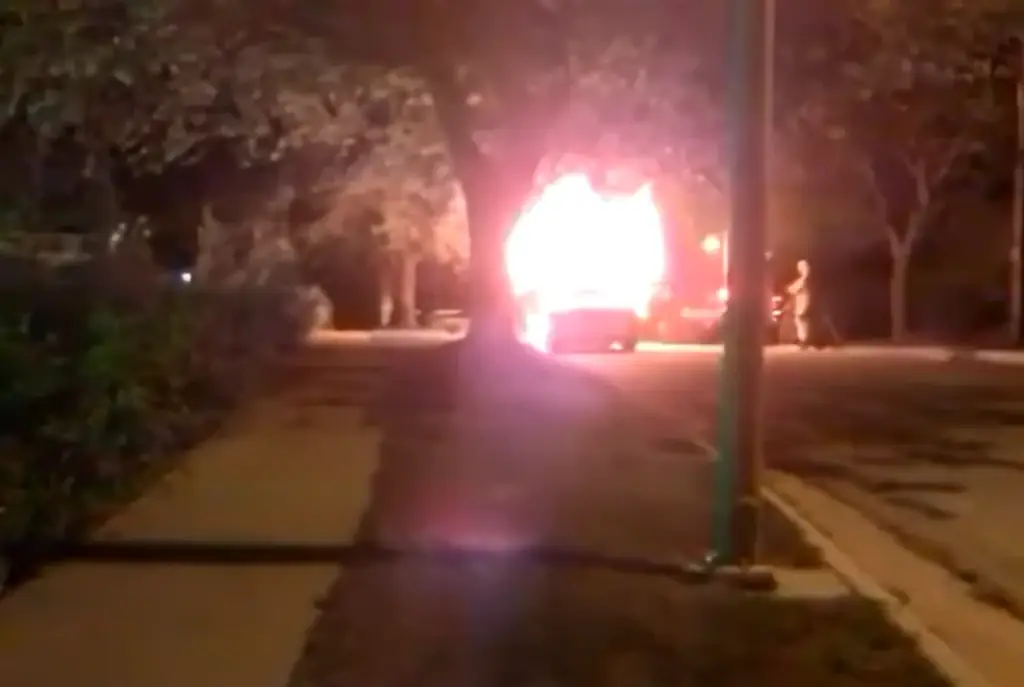 The car went up in flames. Credit: Justin Dearinger