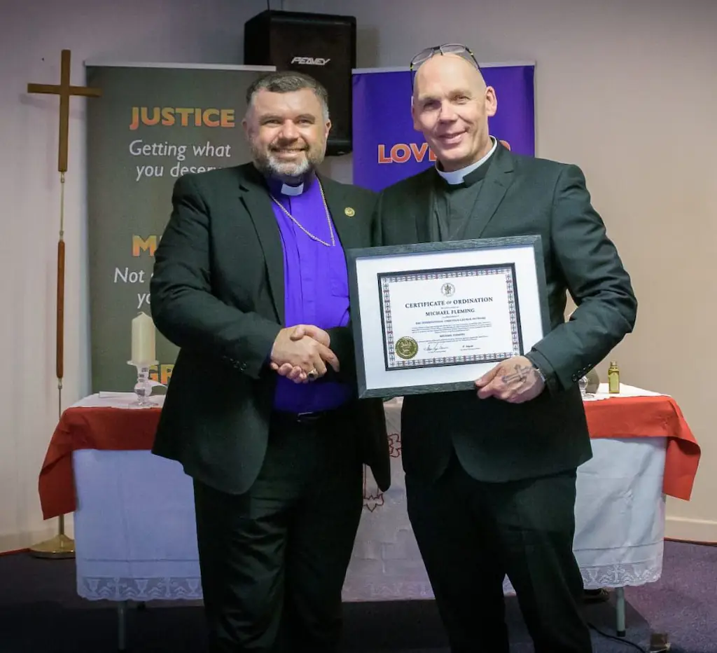 Pastor Mick receiving his ordination certificate. Credit: Pastor Mick Flemming 
