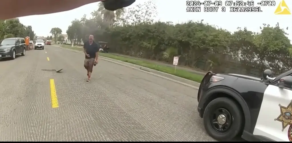 Disturbing bodycam footage shows man accused of decapitating his parents and killing their dog singing Tina Turner songs after being shot