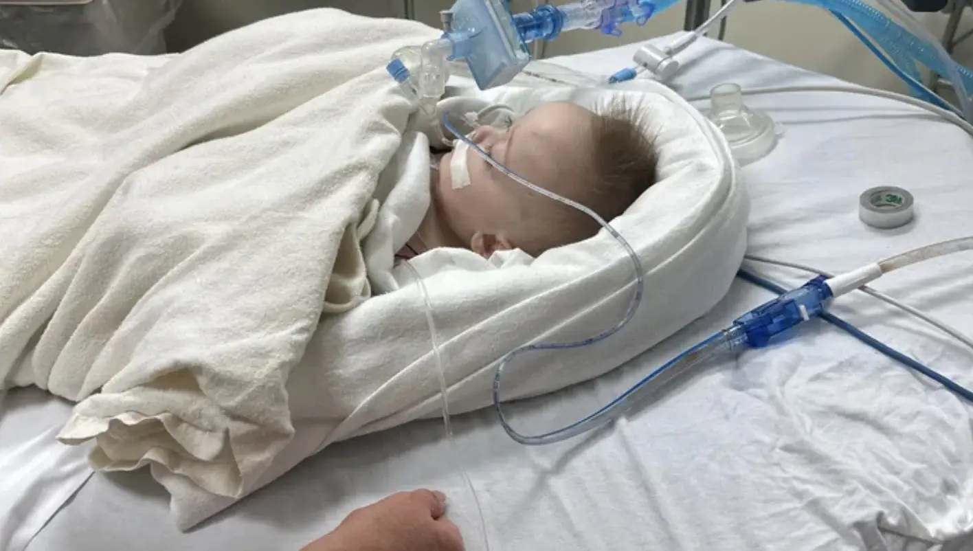 Woman's boyfriend gave her baby boy a bear hug - now the baby is fighting for his life in hospital