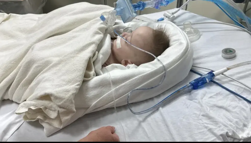 Woman's boyfriend gave her baby boy a bear hug - now the baby is fighting for his life in hospital