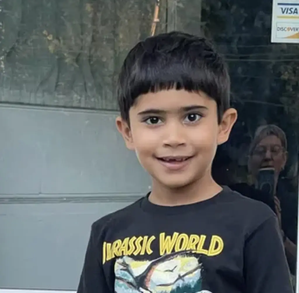 Seven-year-old Micah was swept away in the flood. Credit: GoFundMe