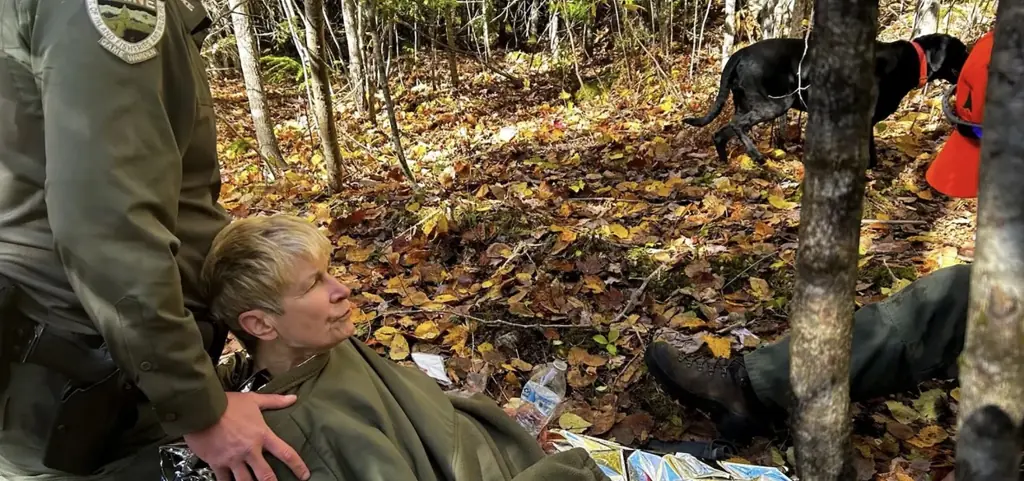 Missing hiker, 72, found alive by dead husband's body after dog slept on her chest to keep her warm