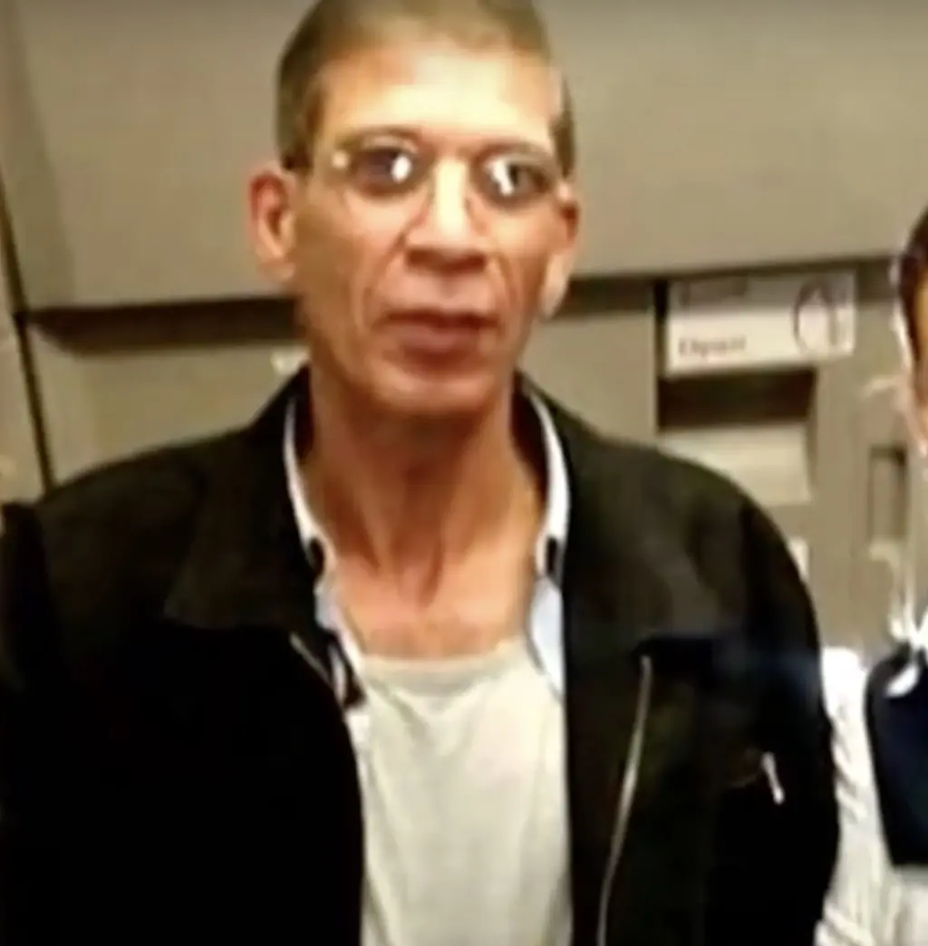 A flight attendant also posed with the hijacker. Credit: Inside Edition/YouTube