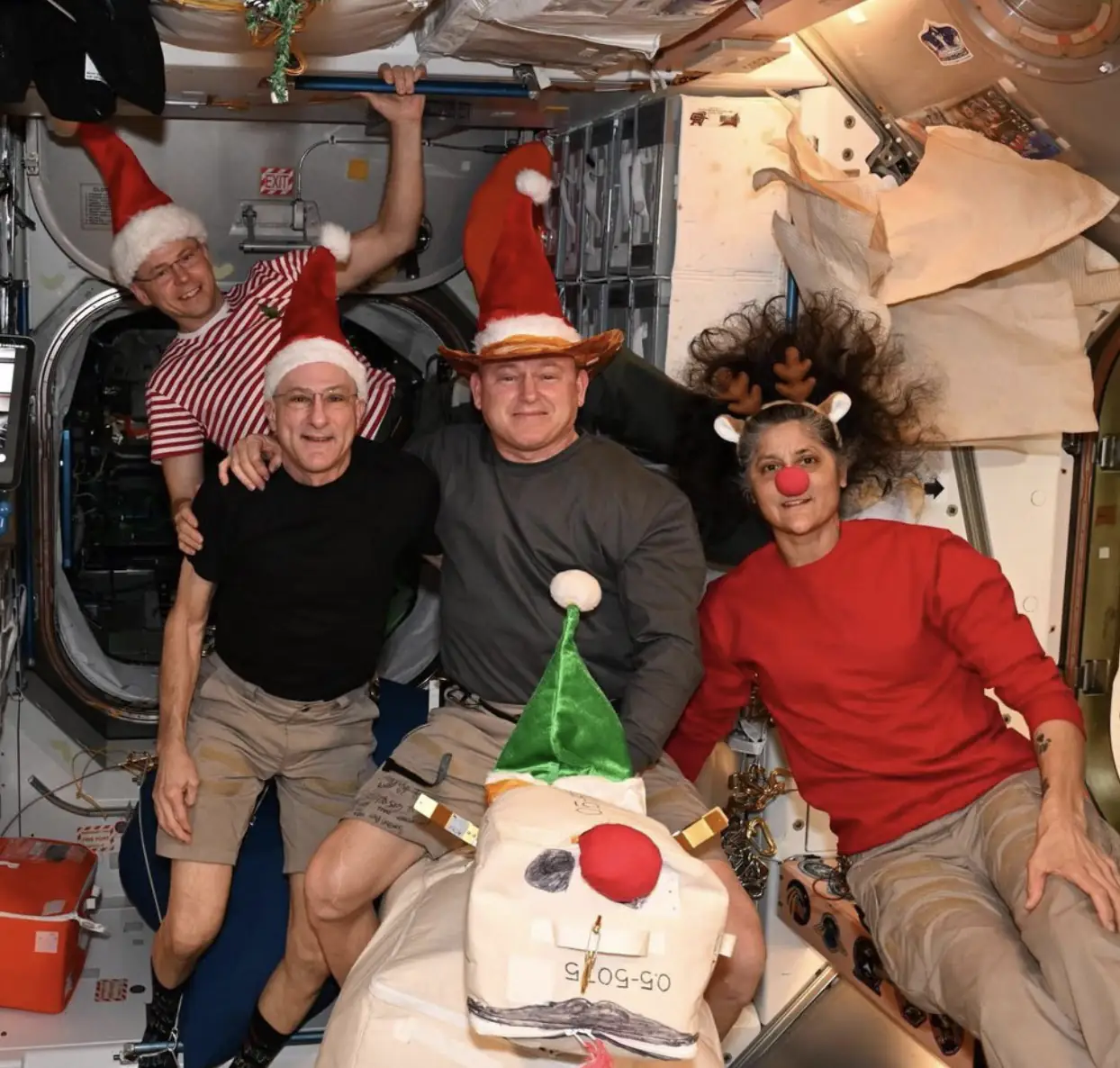 Christmas photo of stranded astronauts on International Space Station sparks outrageous conspiracy theories