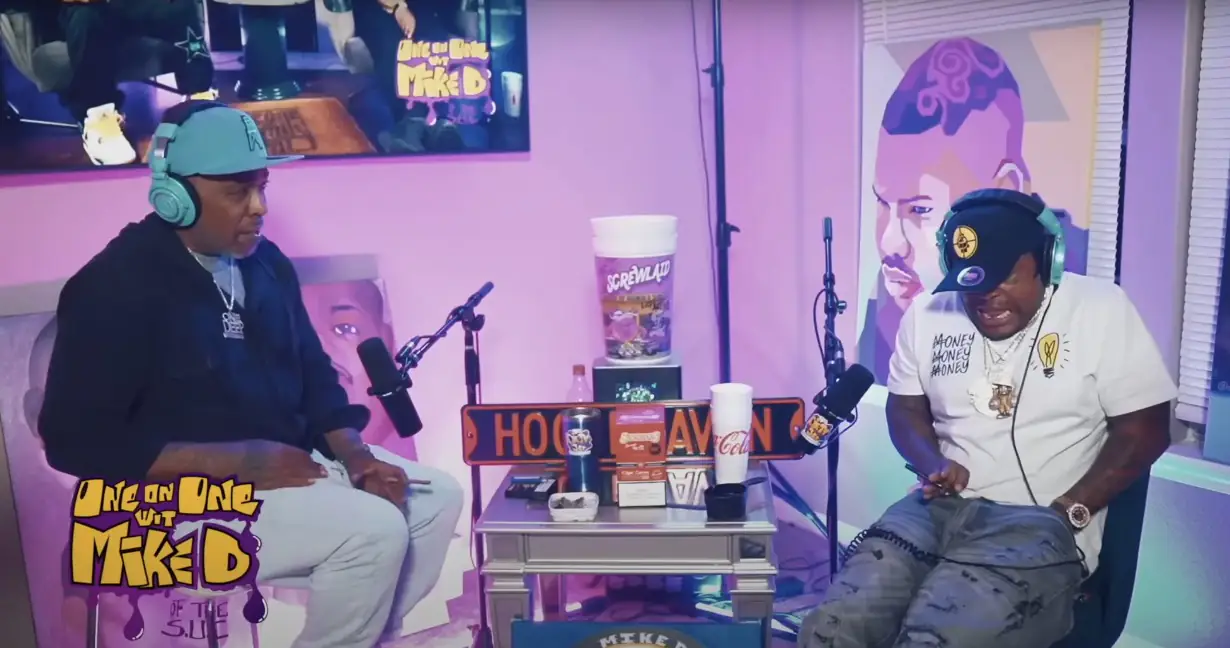Moment Texas rapper accidentally fires gun through his jeans during interview