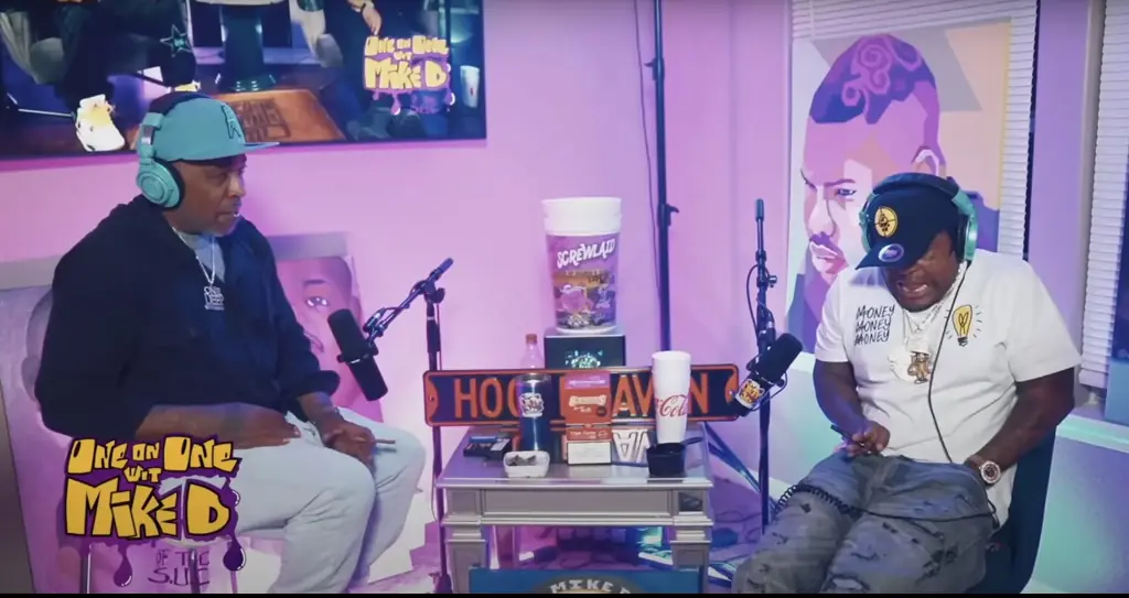 Moment Texas rapper accidentally fires gun through his jeans during interview