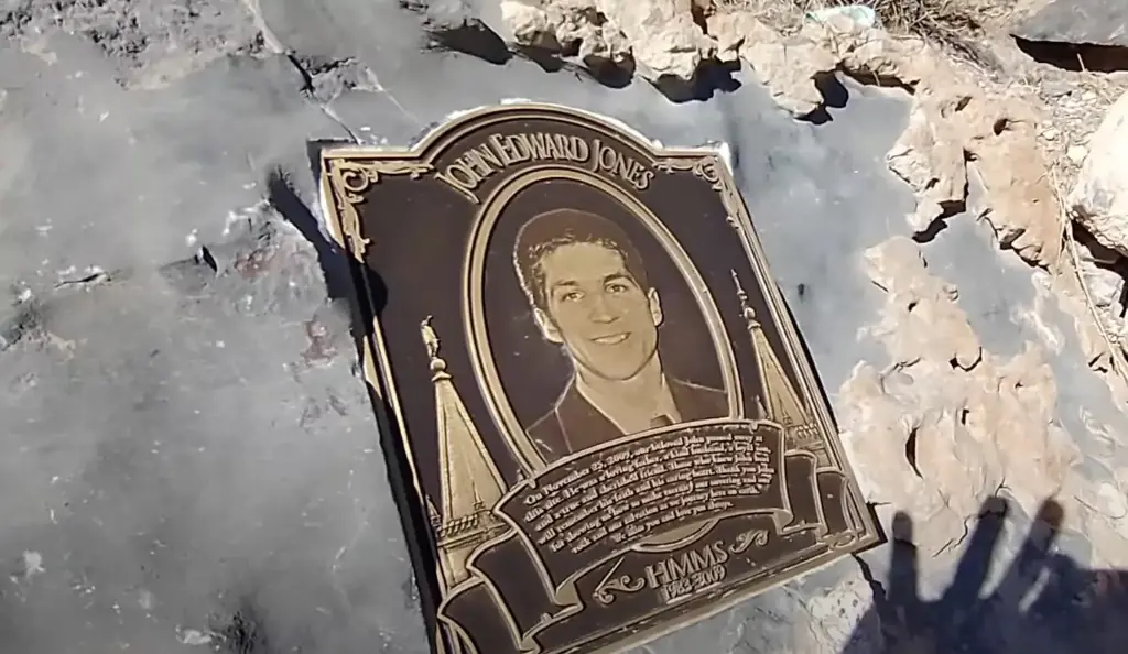 A plaque at the entrance of the cave. Credit: YouTube/Brandon Kowallis
