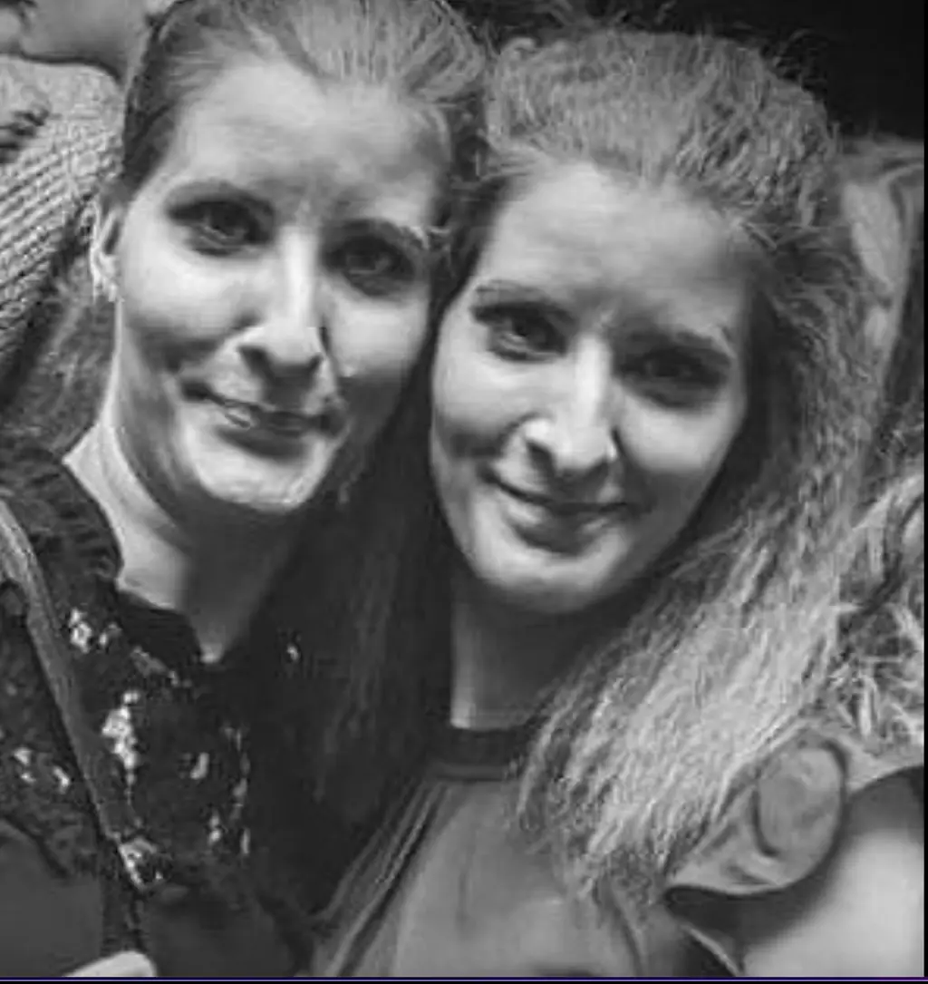 Two bodies found in search for missing identical sisters who disappeared during a walk in the middle of the night