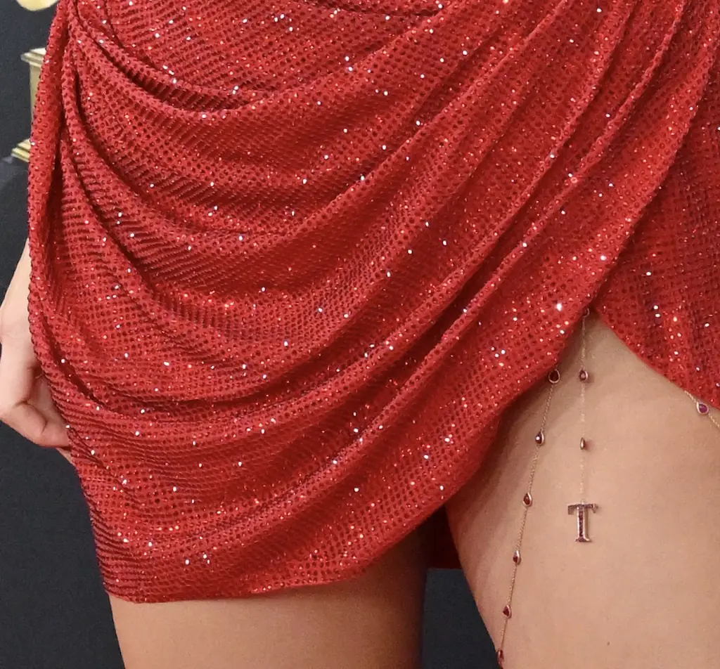 Fans spotted a small 'T' on Swift's thigh.  Credit: Axelle/Bauer-Griffin/FilmMagic/Getty Images