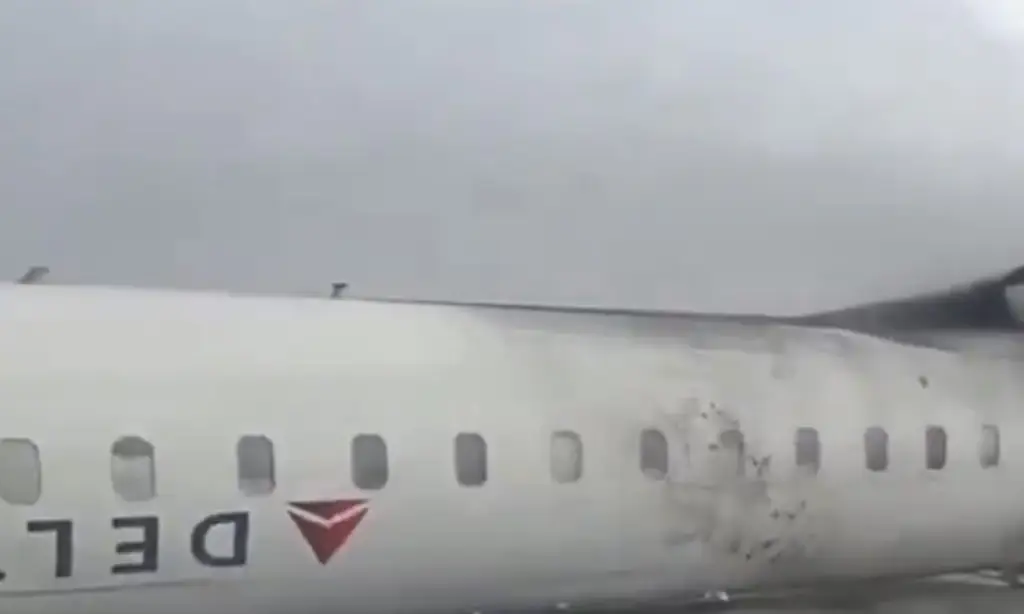 Delta issues statement after at least nine are injured as plane flips on runway