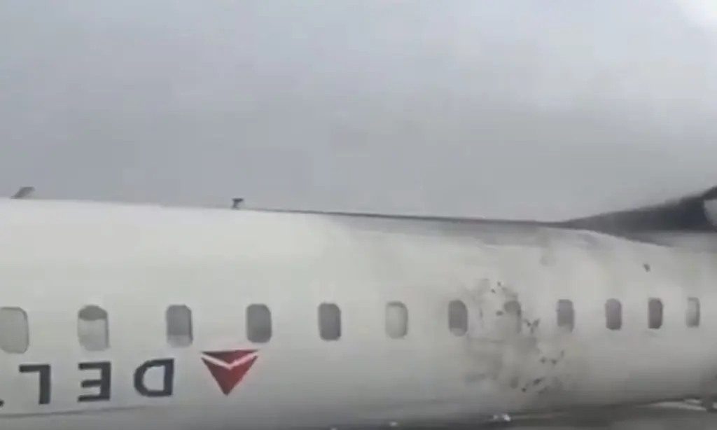 Delta issues statement after at least nine are injured as plane flips on runway
