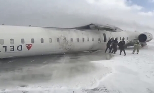 Nine injured after Delta Air Lines plane flips while landing