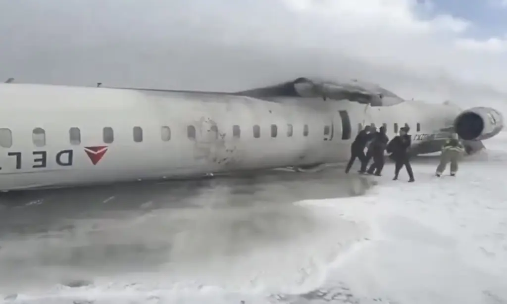Delta issues statement after at least nine are injured as plane flips on runway