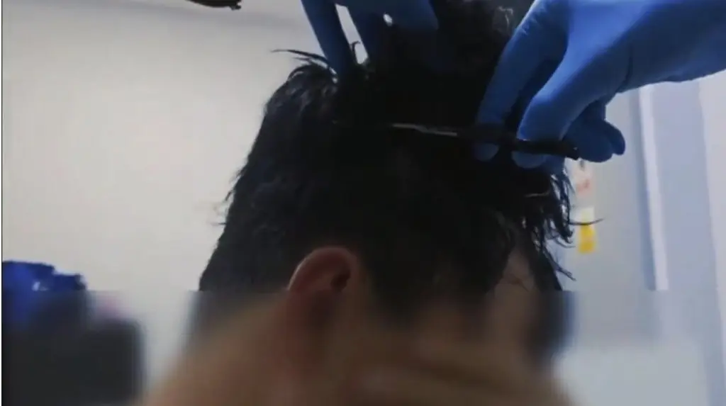 Man caught trying to smuggle cocaine under a wig