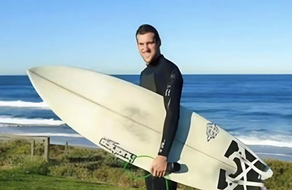Drone captures moment surfer is mauled by shark in front of his girlfriend