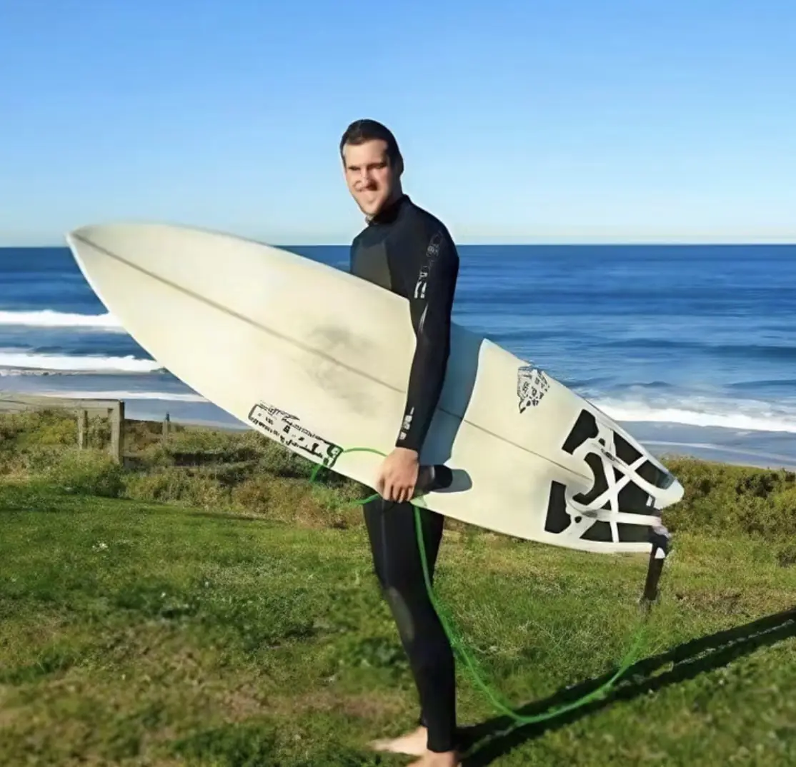 Drone captures moment surfer is mauled by shark in front of his girlfriend
