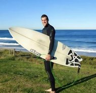 Drone captures moment surfer is mauled by shark in front of his girlfriend