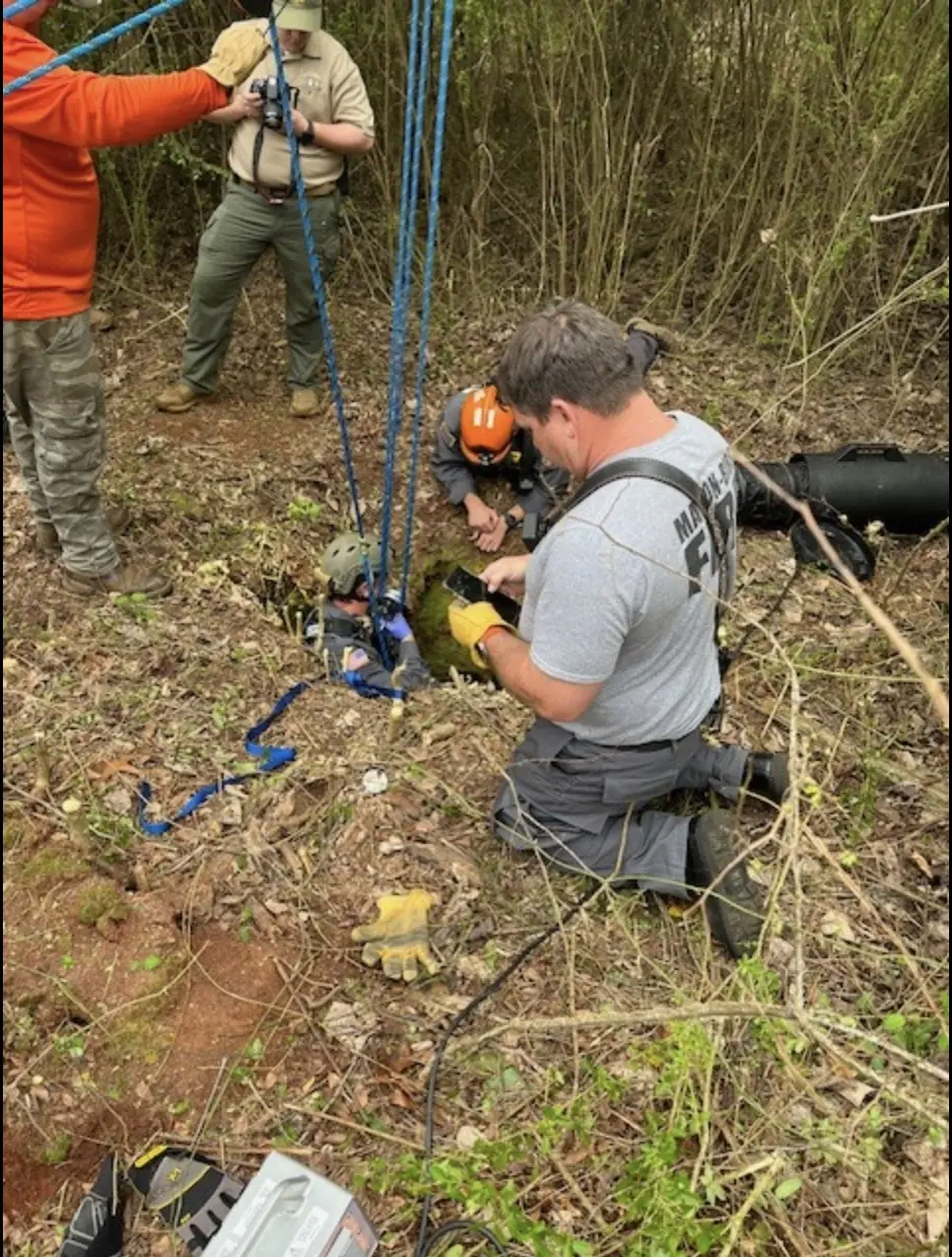 Rescuers were seen being lowered into the hole to recover her body. Credit: Monroe County Sheriff's Office