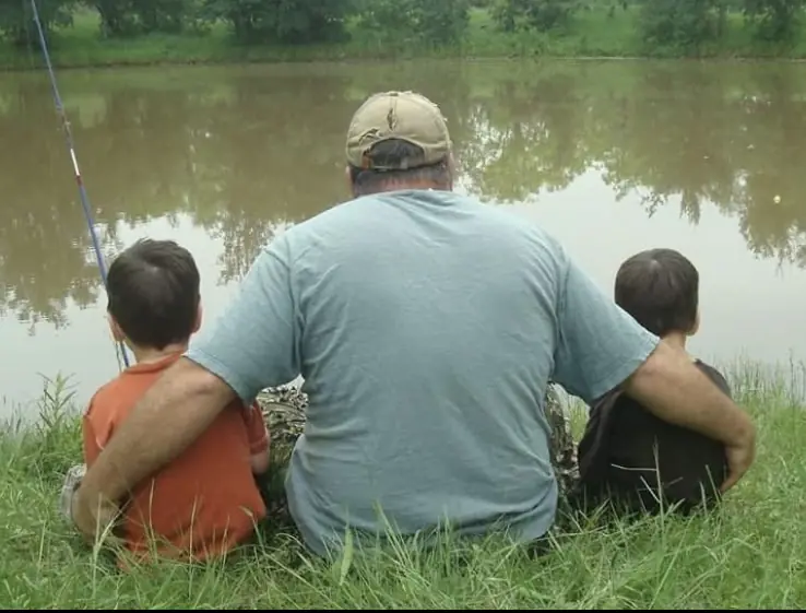 An old family photo of Metcalf with his dad and brother. Credit: GoFundMe
