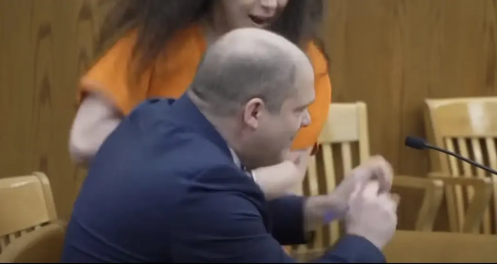 Wisconsin killer who dismembered her boyfriend attacks her own lawyer in court
