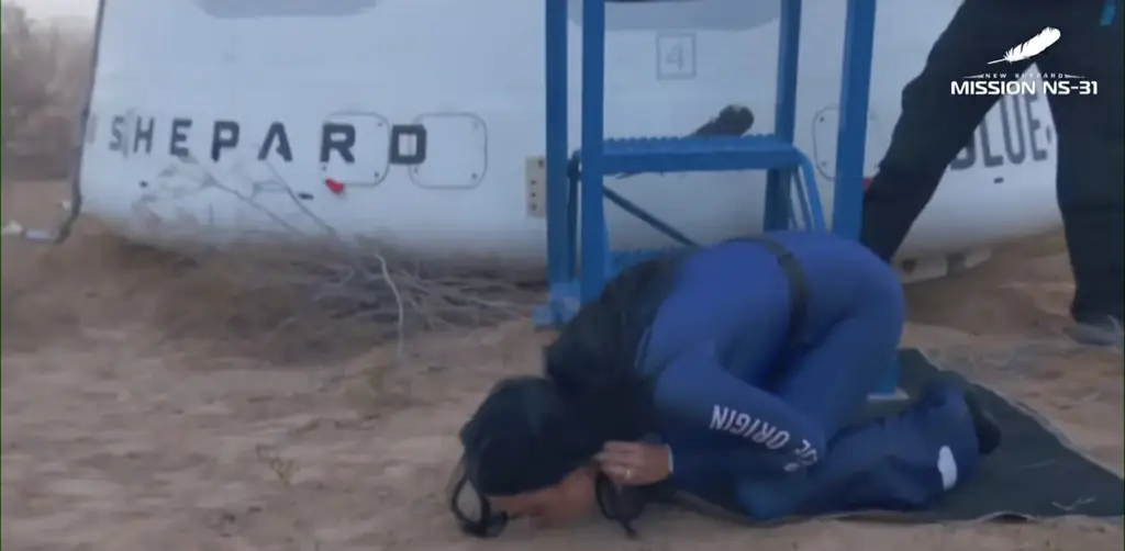 Katy kissed the ground after touching down. Credit: YouTube/Blue Origin