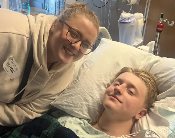 High school athlete is left paralyzed from chest down after tripping over his own feet during warm-up