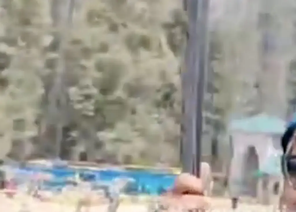 The heartbreaking video shows the man smiling, unaware of the horrors below. Credit: X/@kathiyawadiii