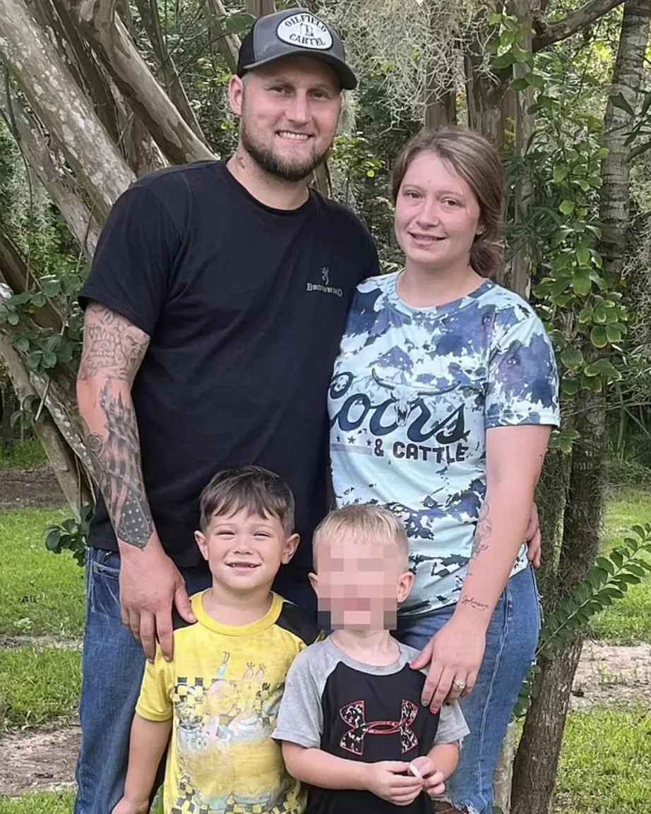 Clinton Earl Johnson with Paiton Rose, 27, and his stepson Kash. Credit: Facebook