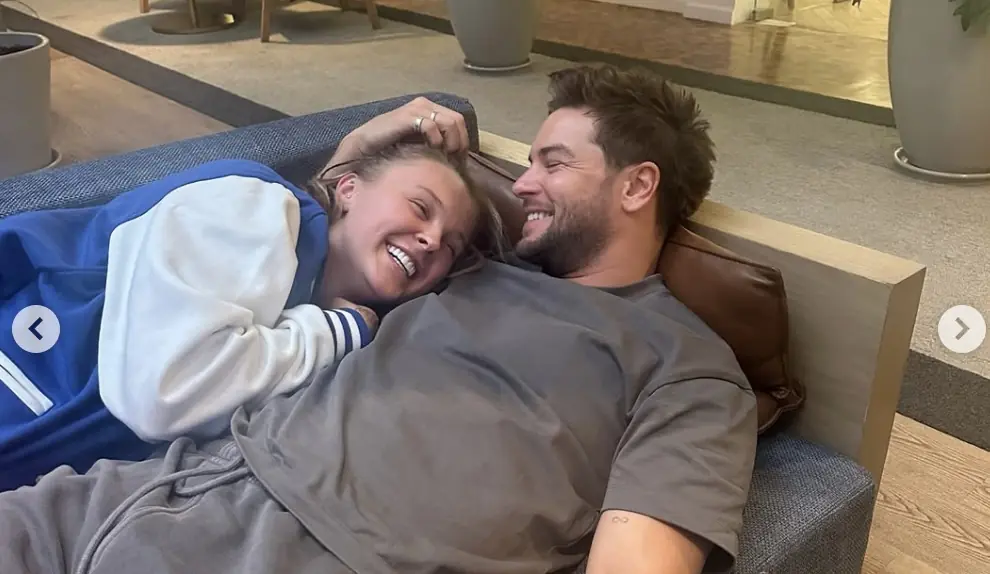 Chris Hughes shocks followers after posting intimate photo of him 'kissing JoJo Siwa in bed' before quickly deleting it