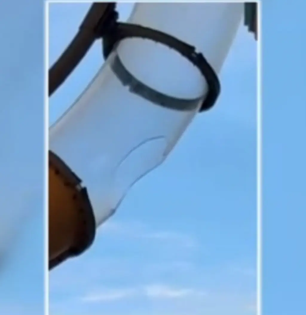 The fibreglass slide broke, causing a passenger to be injured. Credit: Chat News Hub / X.