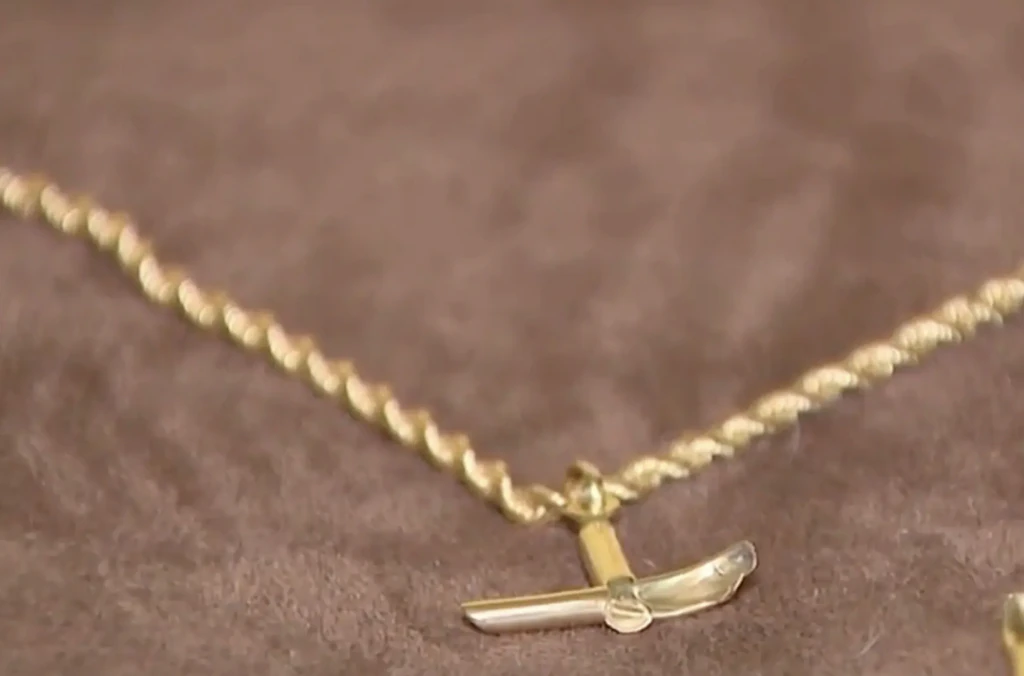 Man survives accidentally being shot in chest after his cross necklace diverted the bullet from his major organs