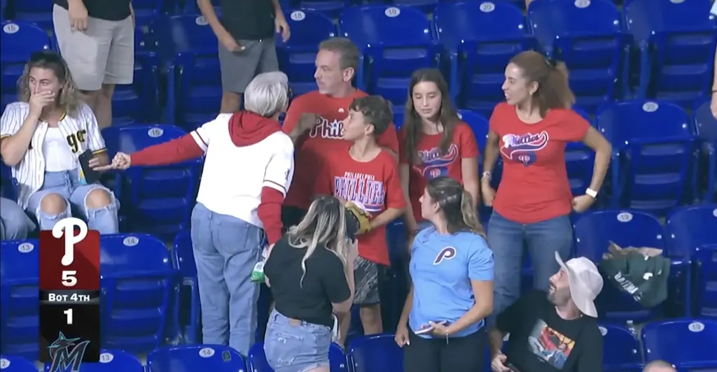 The 'Phillies Karen' ran over and demanded the ball after Harrison Bader's home run. Credit: NBC10 