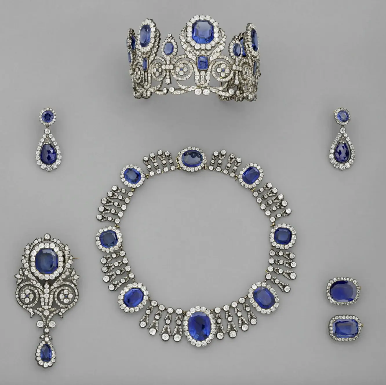 The tiara (top), necklace (middle) and one earring were taken from the Queen Marie Amelie sapphire set. Credit: Louvre