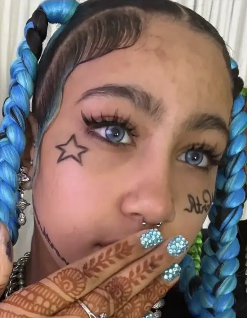 North West with fake tattoos and piercings. Credit: kimandnorth/TikTok