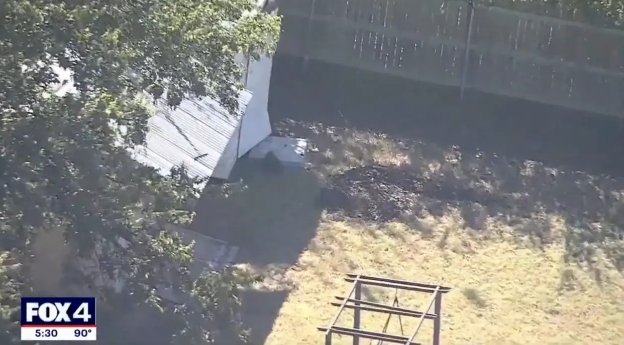 December Marie Mitchell and Jonathan James Mitchell's backyard, where their son was buried. Credit: KDFW