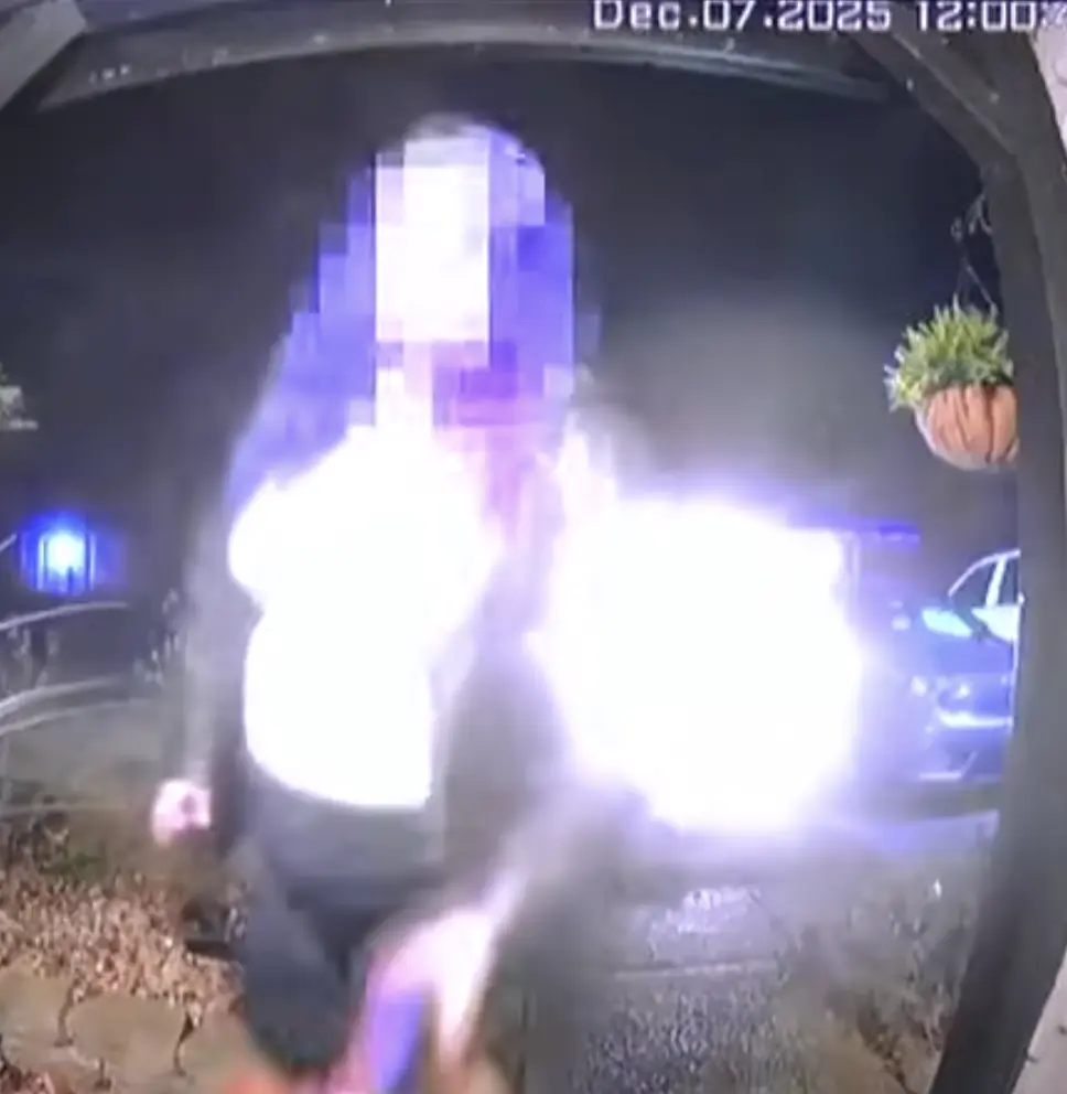 Footage appeared to show a DoorDash delivery driver spraying a customer’s food order with an unknown substance. Credit: Vanderburgh County Sheriff's Office 