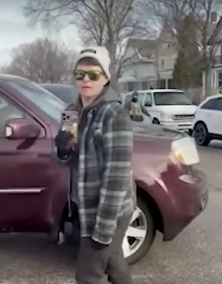 Renee Good's wife films the altercation on her cell phone