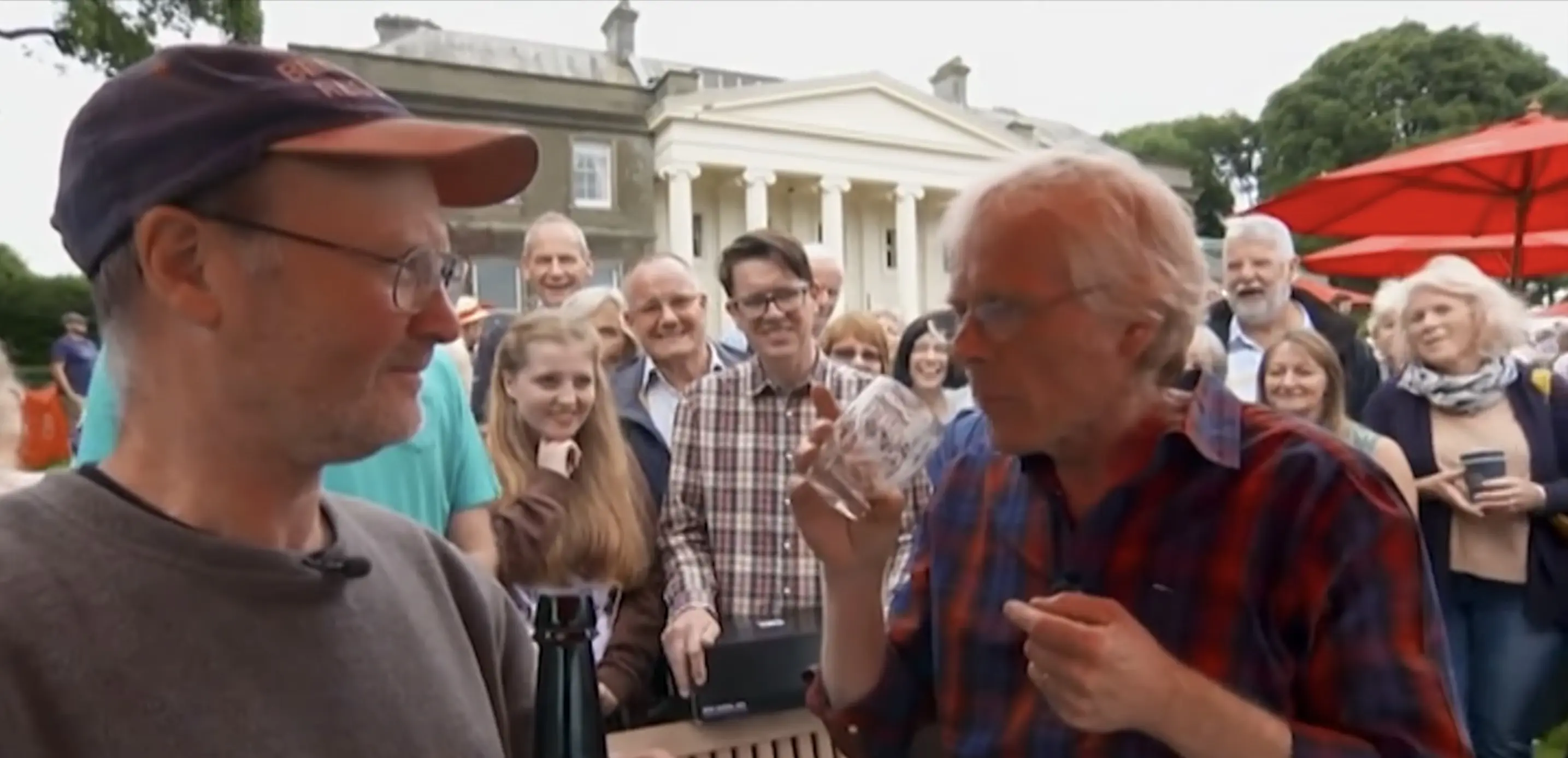 The expert tasted the liquid inside the ancient bottle. Credit: BBC One
