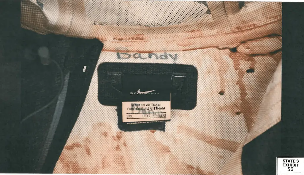 The coach's jacket was covered in blood. Credit: Collin County