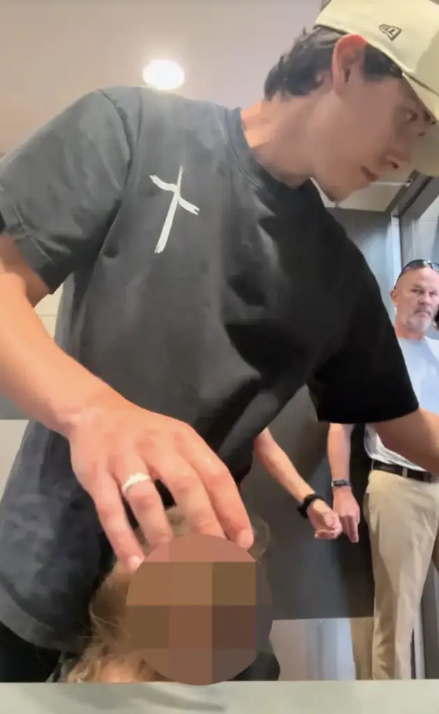 The man (stood behind) has been fired from his job. Credit: Tiktok/tylerbrodsky2