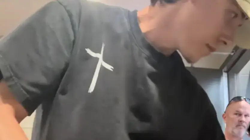 The man (stood behind) has been fired from his job. Credit: Tiktok/tylerbrodsky2